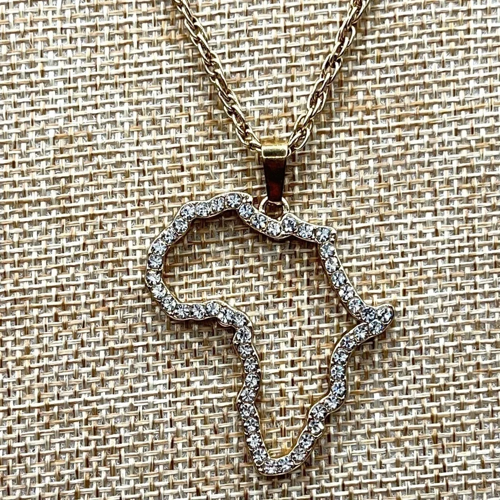 Africa Pendant Outline Gold Tone with clear rhinestones! 18” gold tone necklace!